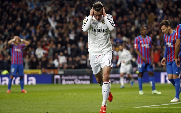Real Madrid's Gareth Bale celebrates his goal against Levante during their Spanish First Division soccer match at Santiago Bernabeu stadium in Madrid