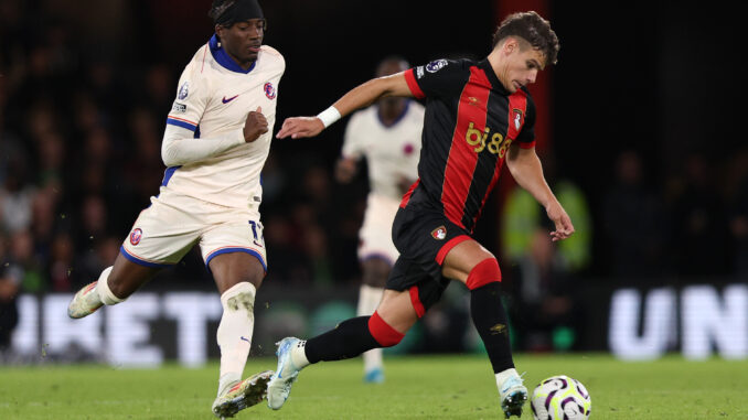 BOURNEMOUTH, ENGLAND - SEPTEMBER 14: Milos Kerkez of AFC Bournemouth controls the ball under pressure from Noni Madueke of Chelsea during the Premier League match between AFC Bournemouth and Chelsea FC at Vitality Stadium on September 14, 2024 in Bournemouth, England. (Photo by Ryan Hiscott/Getty Images)