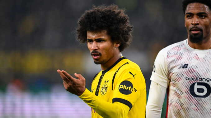 DORTMUND, GERMANY - MARCH 04: Karim Adeyemi of Dortmund reacts during the UEFA Champions League 2024/25 UEFA Champions League 2024/25 Round of 16 first leg match between Borussia Dortmund and LOSC Lille at on March 04, 2025 in Dortmund, Germany. (Photo by Daniel Kopatsch/Getty Images)